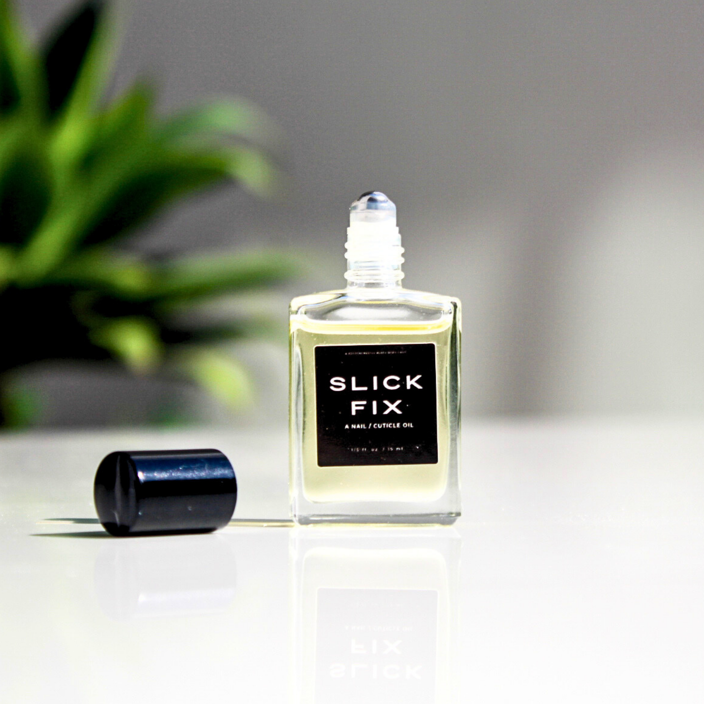SLICK FIX, A NAIL / CUTICLE OIL